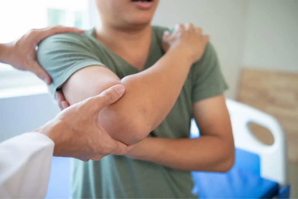 patient with elbow arthritis, exploring the symptoms and available treatment options.