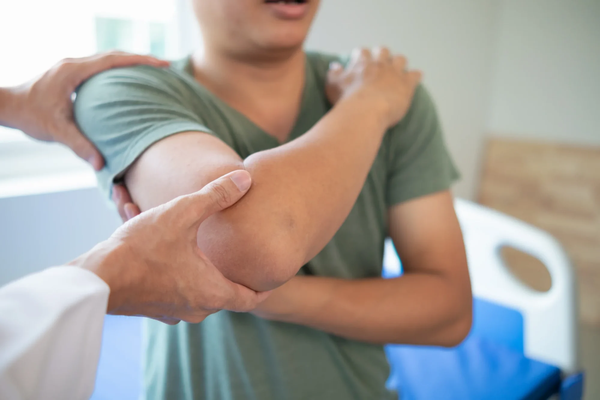patient with elbow arthritis, exploring the symptoms and available treatment options.