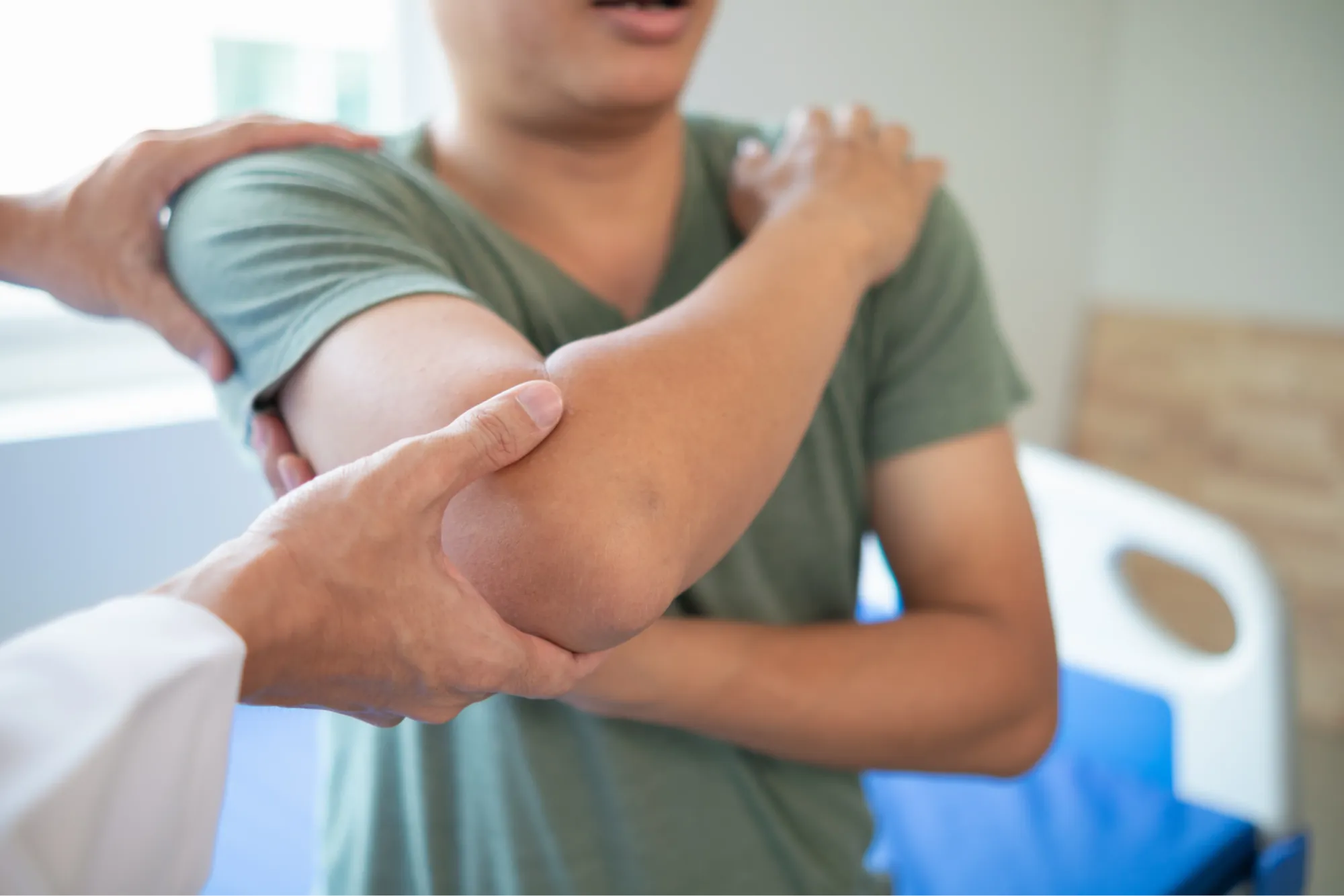 patient with elbow arthritis, exploring the symptoms and available treatment options.