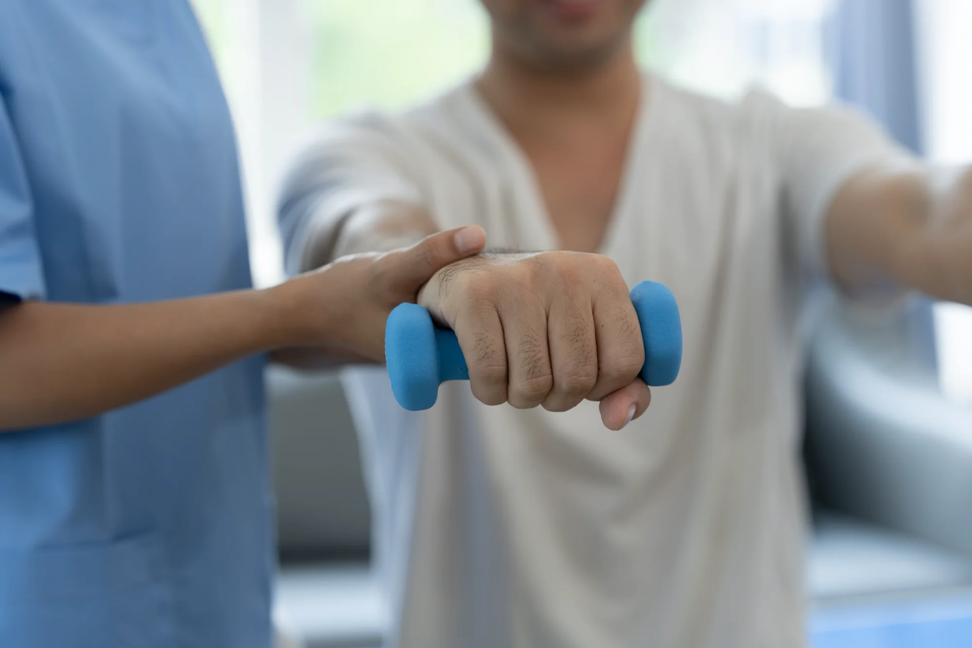 Person doing shoulder PT after shoulder surgery
